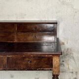 Wooden lady's desk says "happiness of the day"