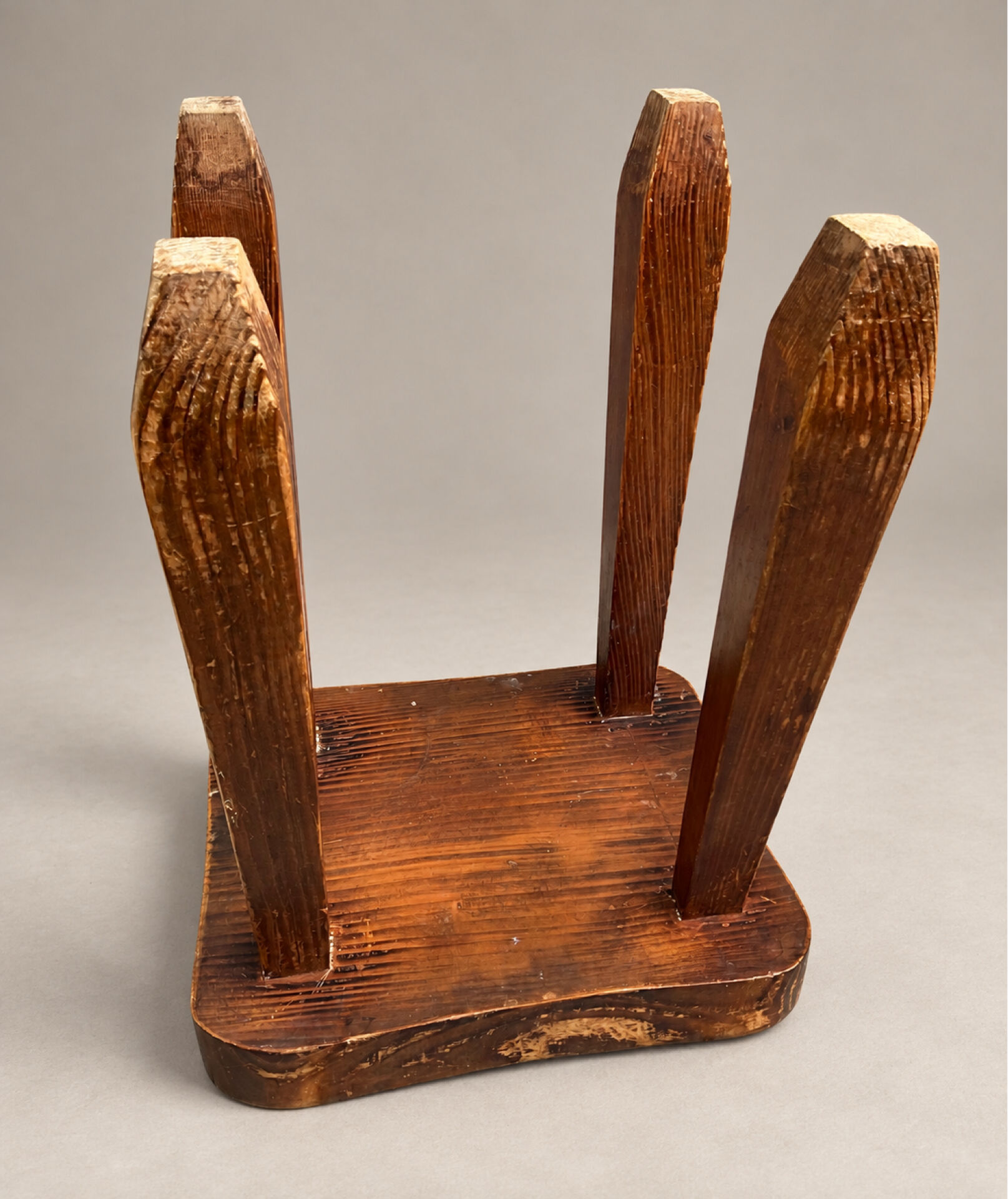 Vintage sculptural solid wood stool, brutalist style.
