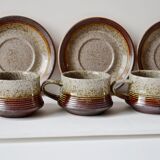 Cups and saucers in sandstone