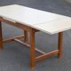 Wood and formica table with extensions
