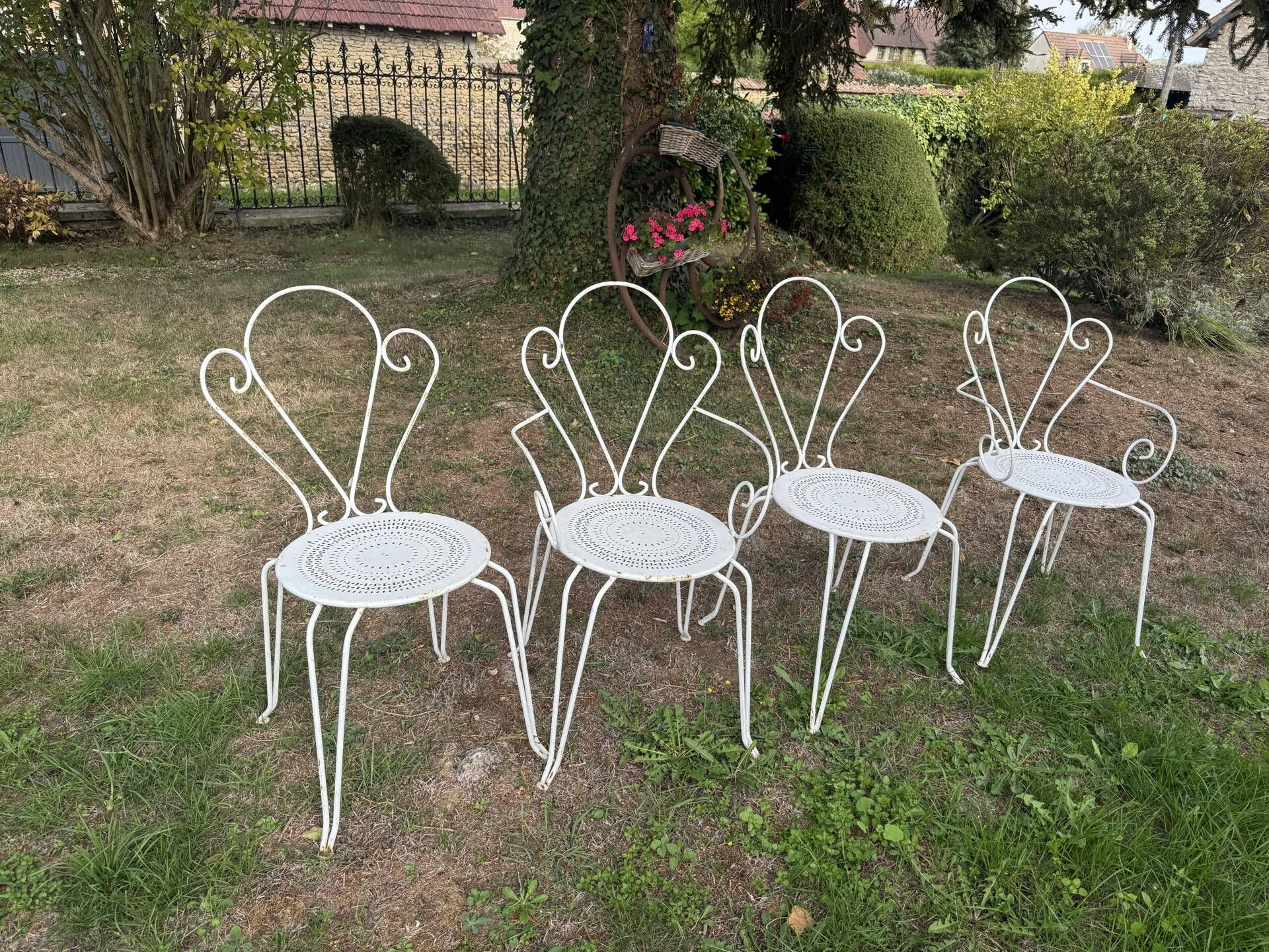 Set of 4 wrought iron garden chairs