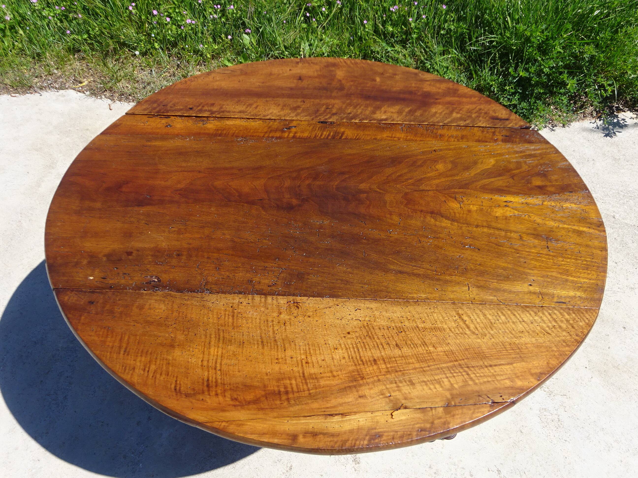 Antique walnut console table with honey spoon legs.