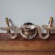 Old vintage wall lamp, brass glass and fake candle mirror