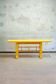 Console laquée jaune avec un plateau rabattable par McGuire San Francisco, années 1970.