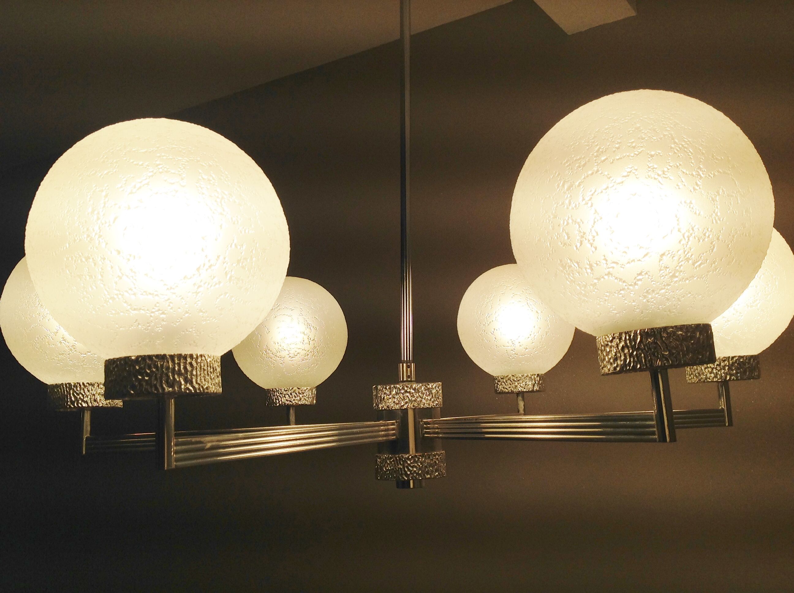 Six-light chrome metal chandelier and opaque glass globes / vintage 60s and 70s