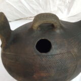 Pourer, terracotta teapot. Hen.