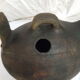 Pourer, terracotta teapot. Hen.