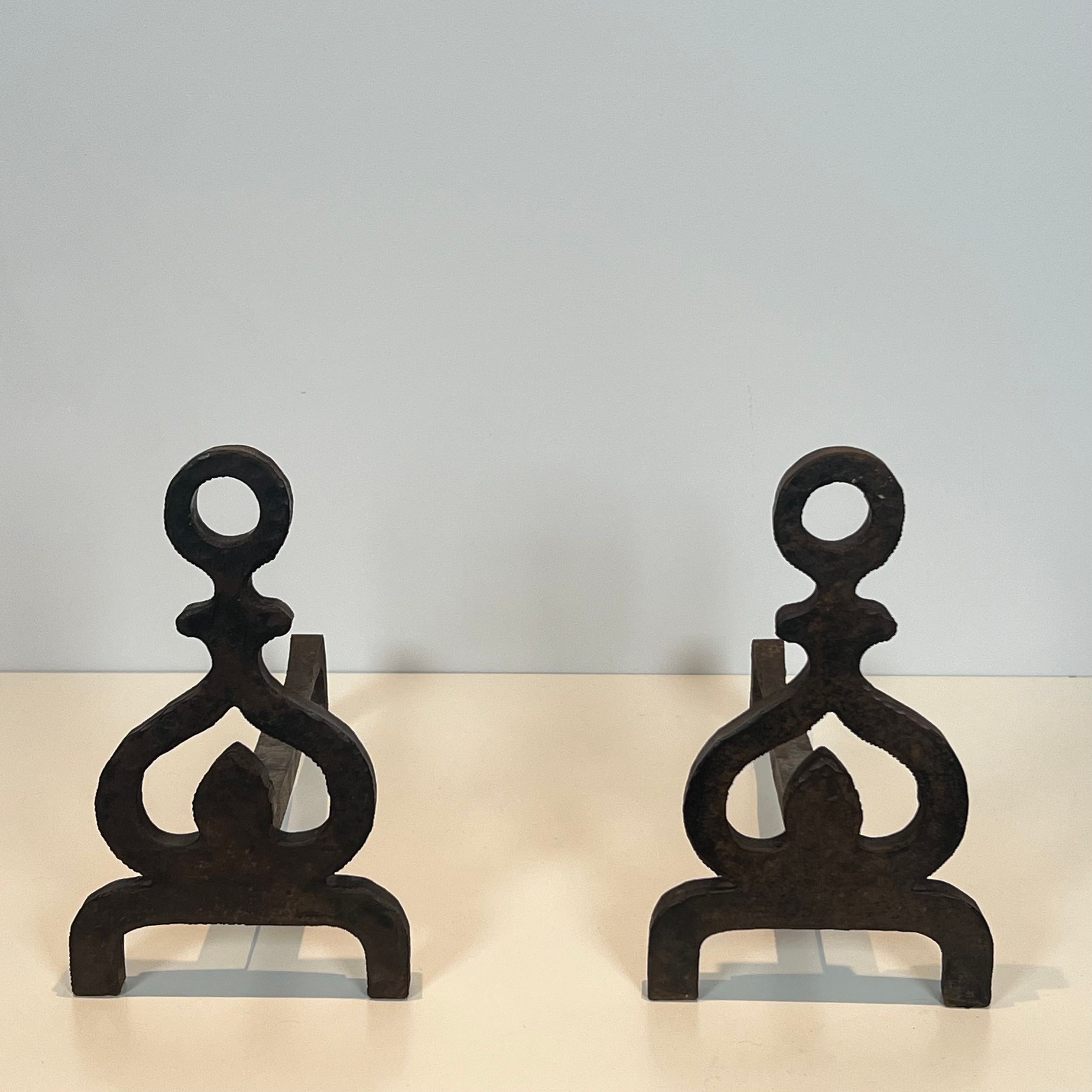 Pair of modernist wrought iron fire dogs.