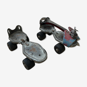 Old pair of roller skates flyer skates metal