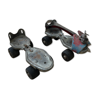 Old pair of roller skates flyer skates metal