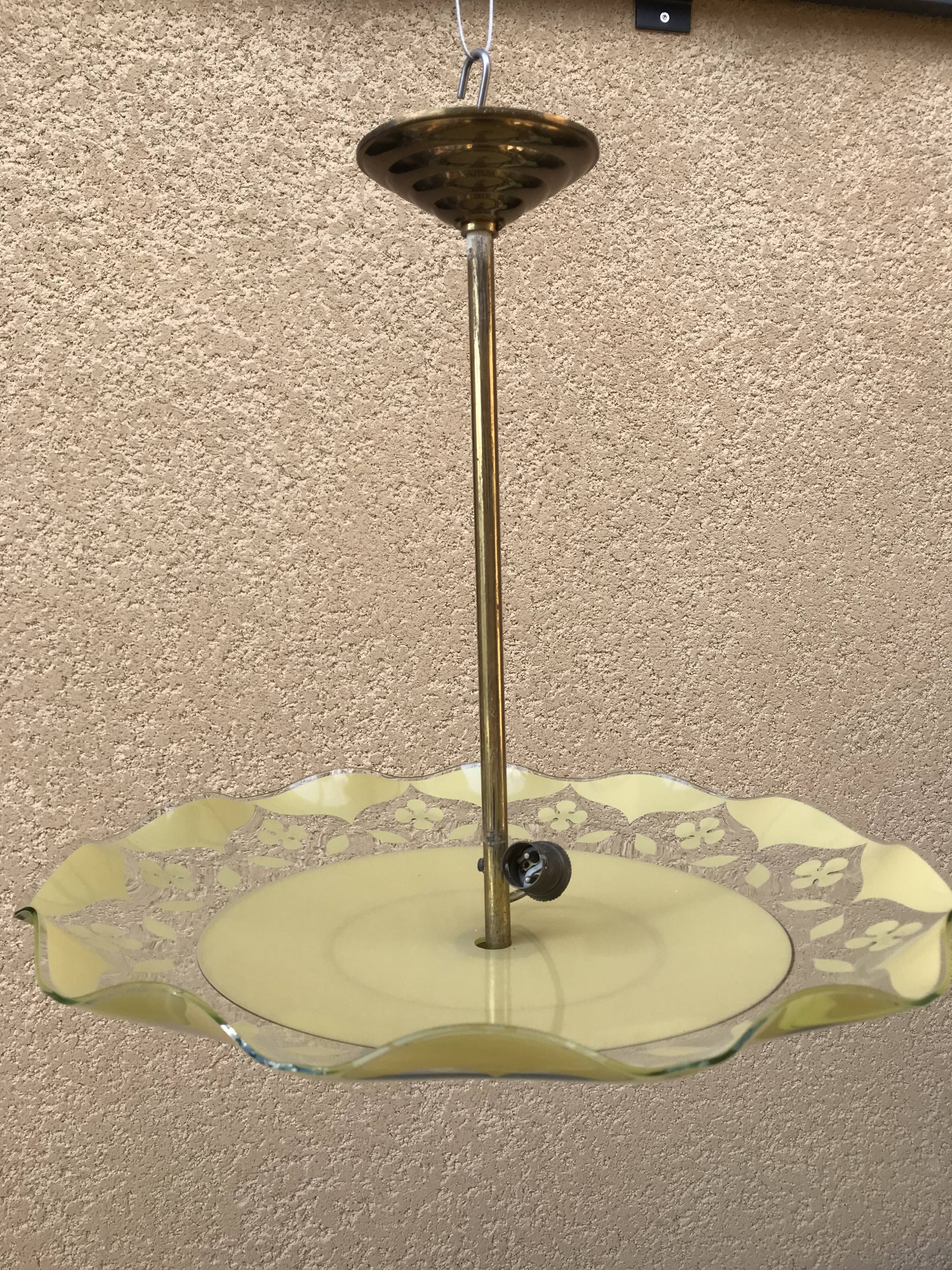 Brass and yellow glass hanging lamp