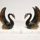Pair of ancient zoomorphic bookends, swan statues