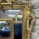 Antique mirror with a frame 123/100cm with gilded pediments, eagle heads, antique.