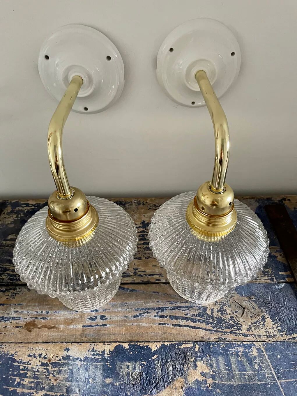 Pair of vintage electrified glass wall lamps