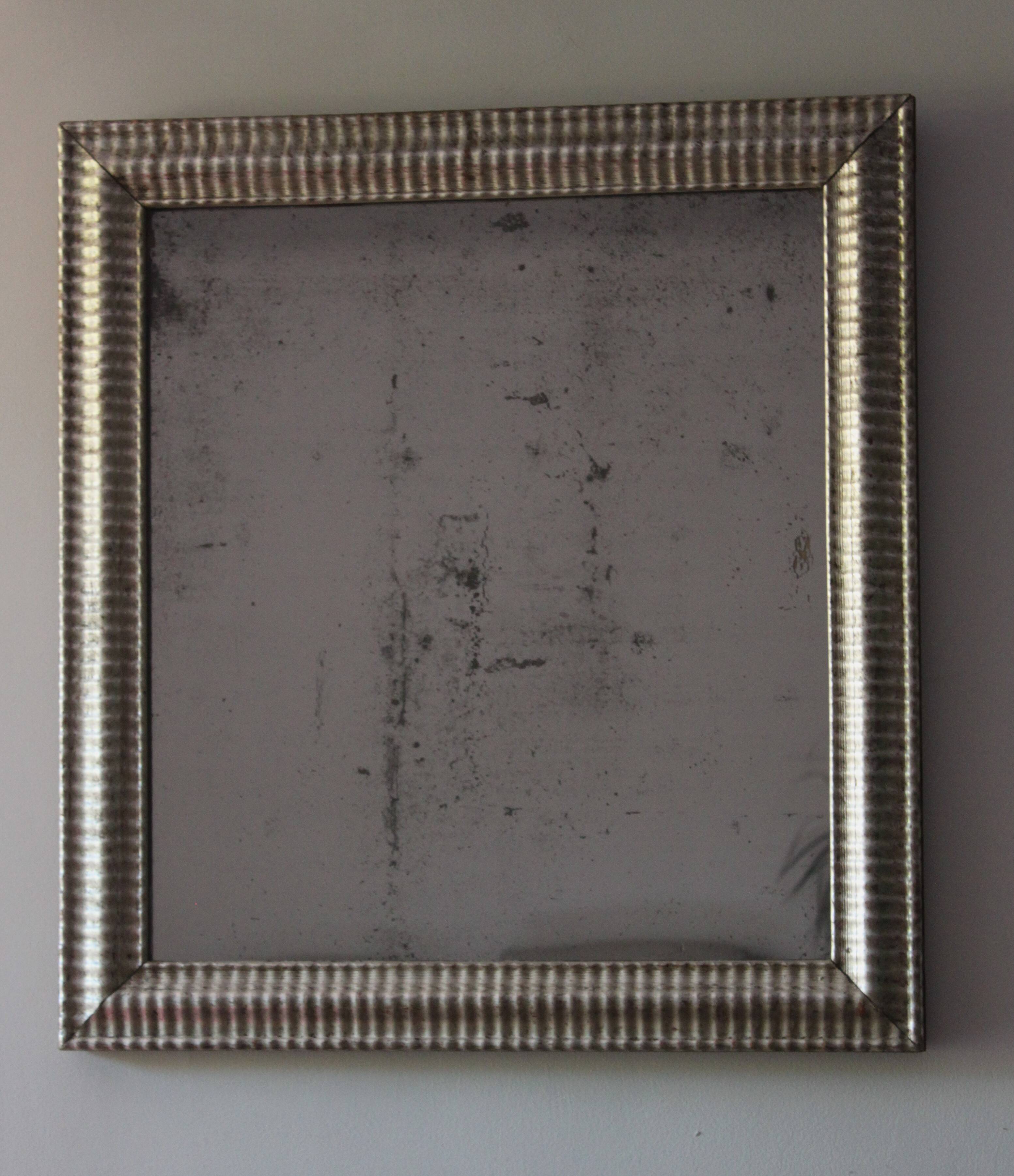 Antique silver mirror 19th century with its mercury glass