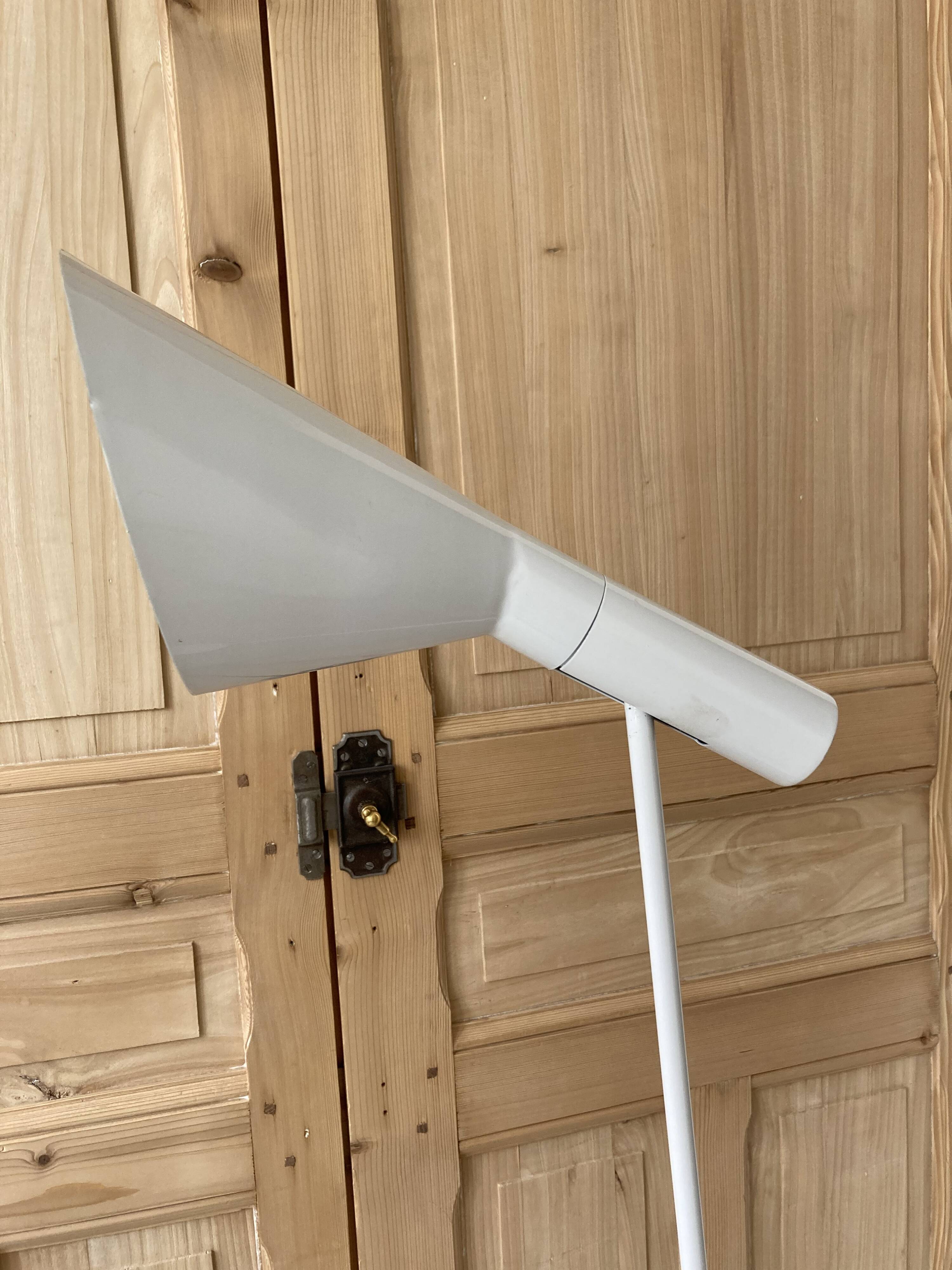 white lacquered metal reading lamp