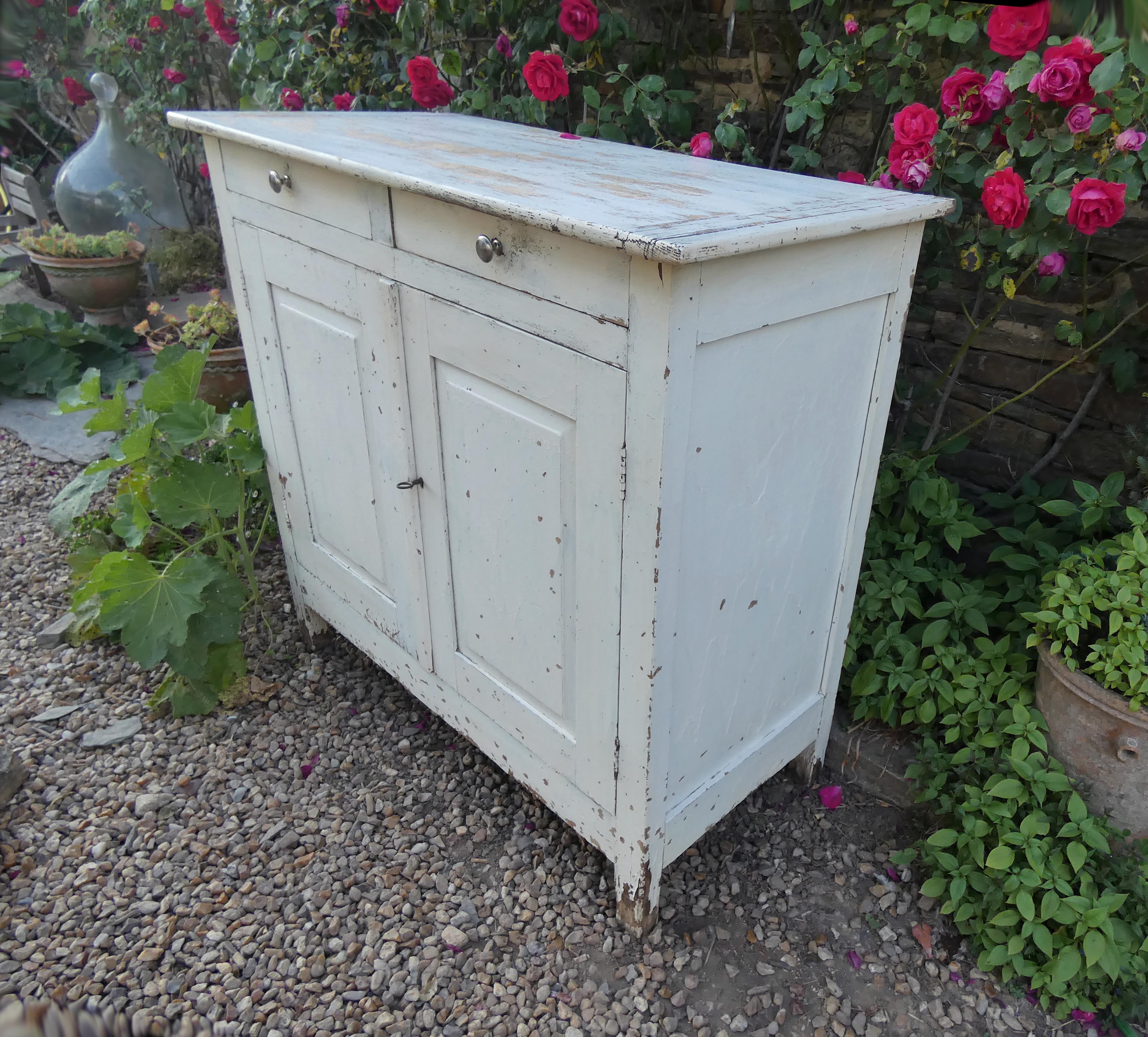 Old patinated wooden sideboard