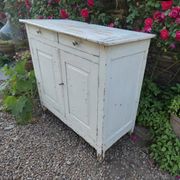Old patinated wooden sideboard