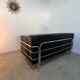 Old vintage leather and tubular metal sofa, design 70s
