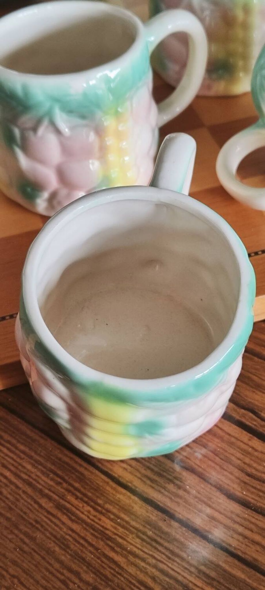 Set of 4 vintage multicoloured slipware coffee cups.