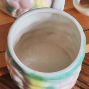 Set of 4 vintage multicoloured slipware coffee cups.
