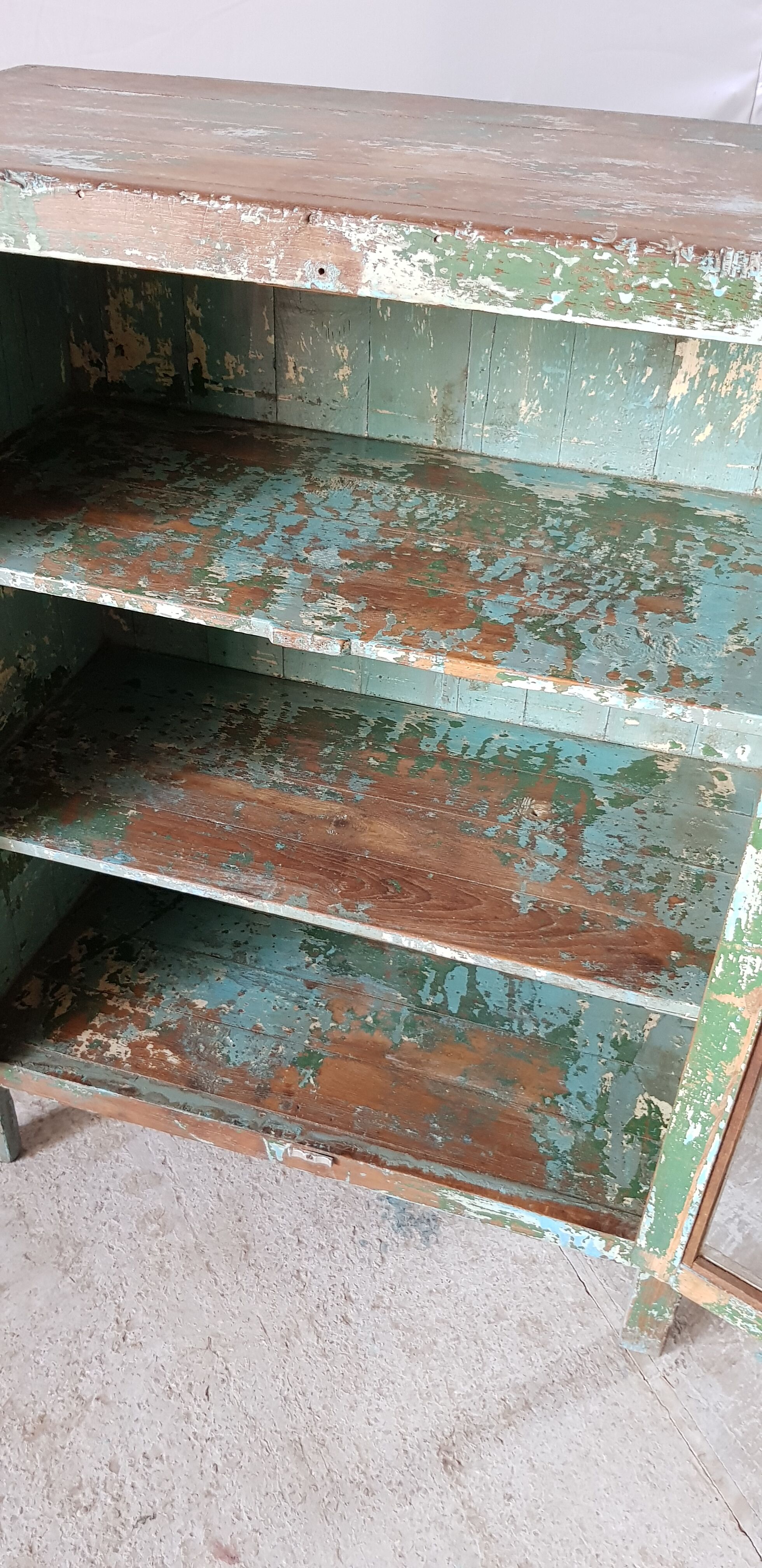 Former teak cabinet with its original green patina