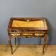 Louis XV slant-top desk in marquetry from the 18th century.
