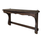 Antique wall shelf with patina from a flea market.