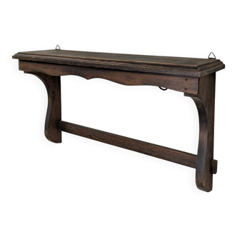 Antique wall shelf with patina from a flea market.