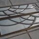 Deux vitraux en verre biseauté et laiton