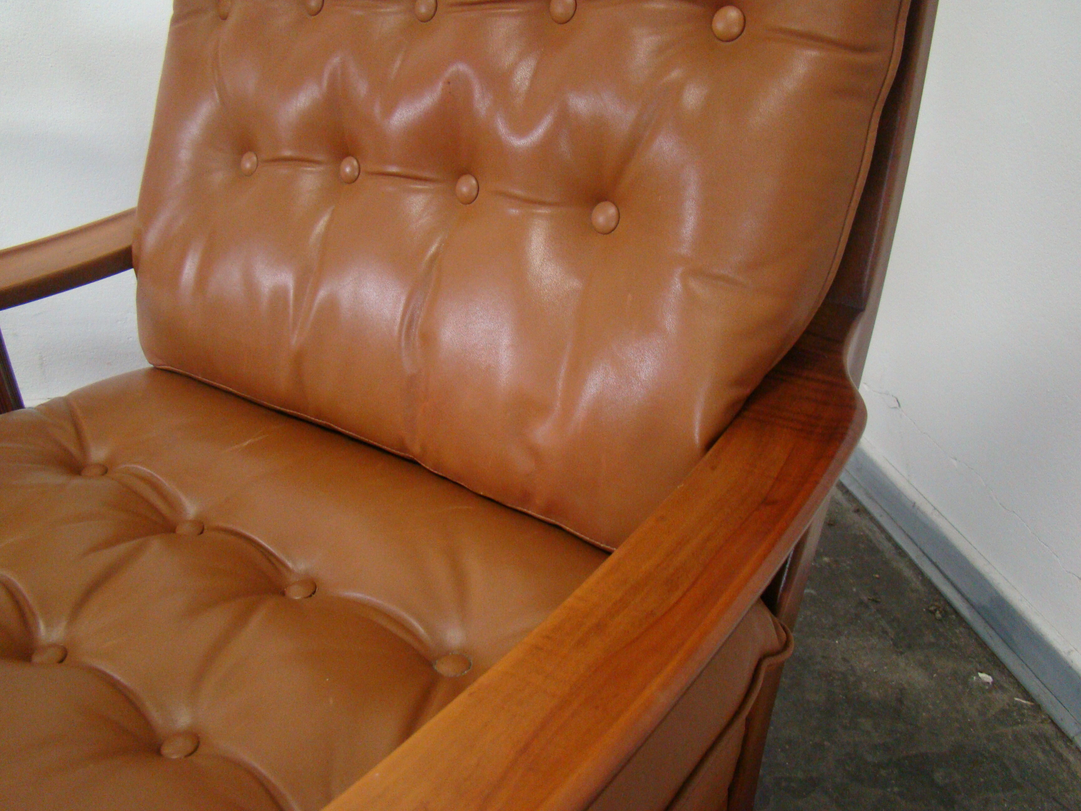 Fauteuil chesterfield en cuir vintage