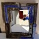 Mirror with ceramic frame