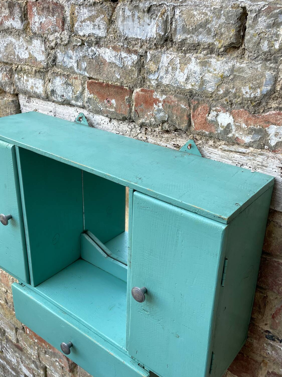 Old wall-mounted bathroom cabinet
