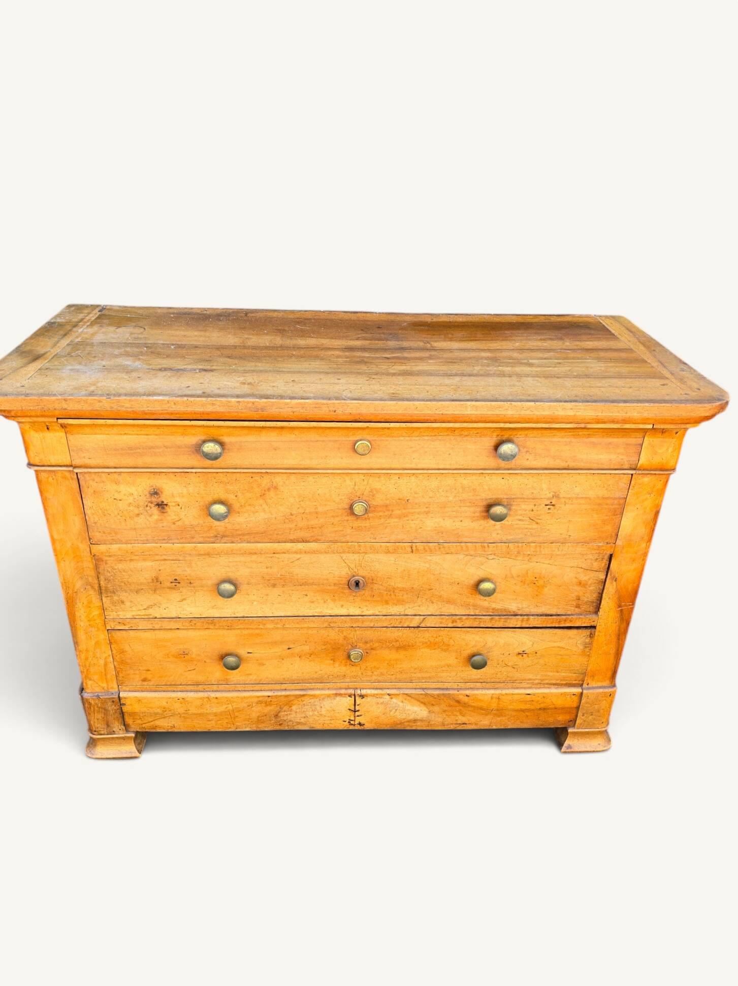 Commode Louis-Philippe en bois blond 4 tiroirs, XIXe