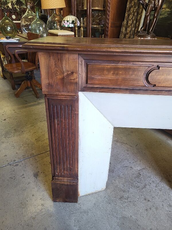 Facade of antique wooden fireplace