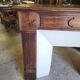 Facade of antique wooden fireplace