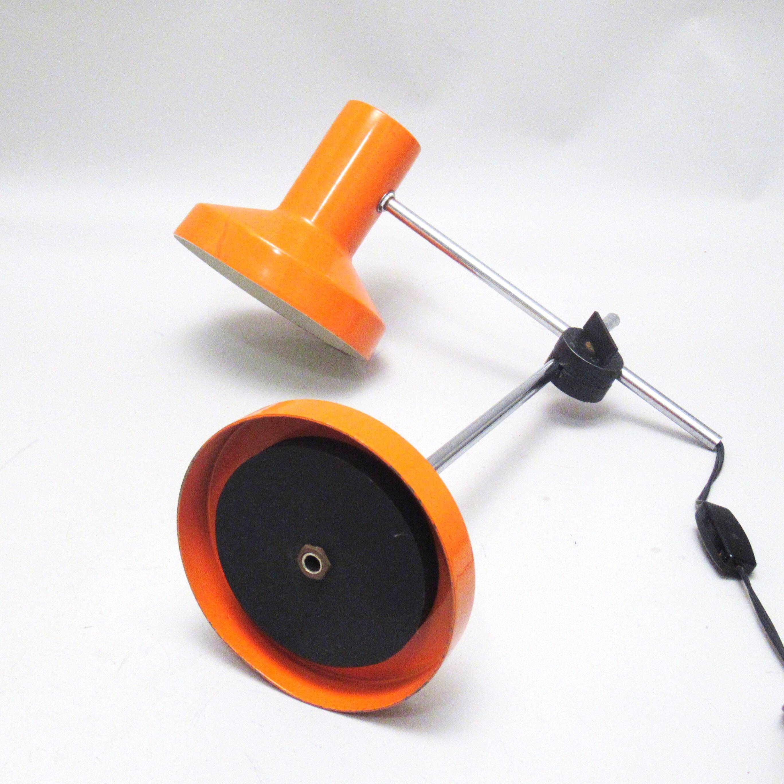 Orange articulated desk lamp from the 1970s