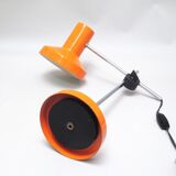 Orange articulated desk lamp from the 1970s