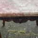 Carved wooden coffee table with shell pattern and removable pink marble top, old