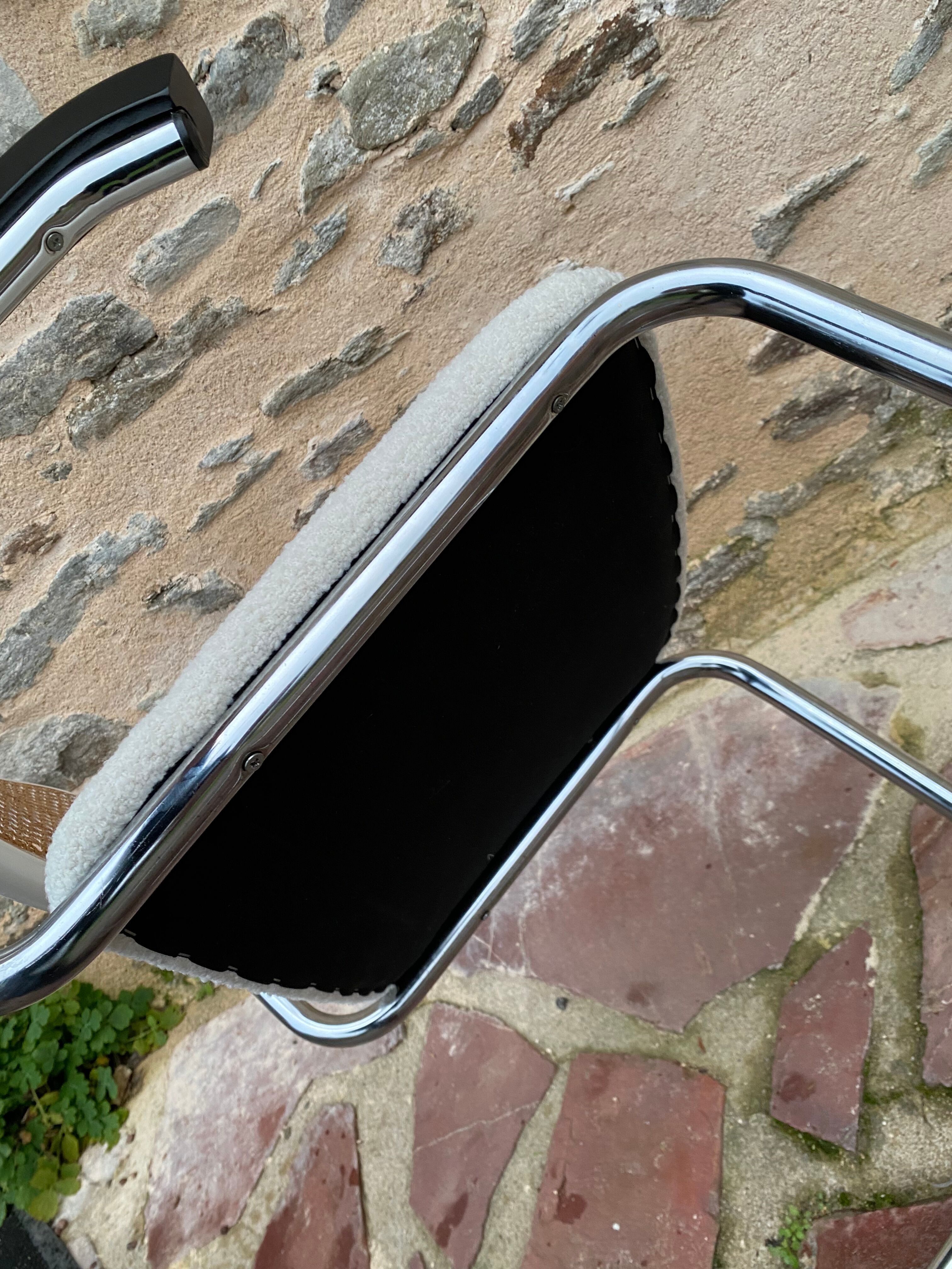 Cantilever armchair in cane and bouclette fabric