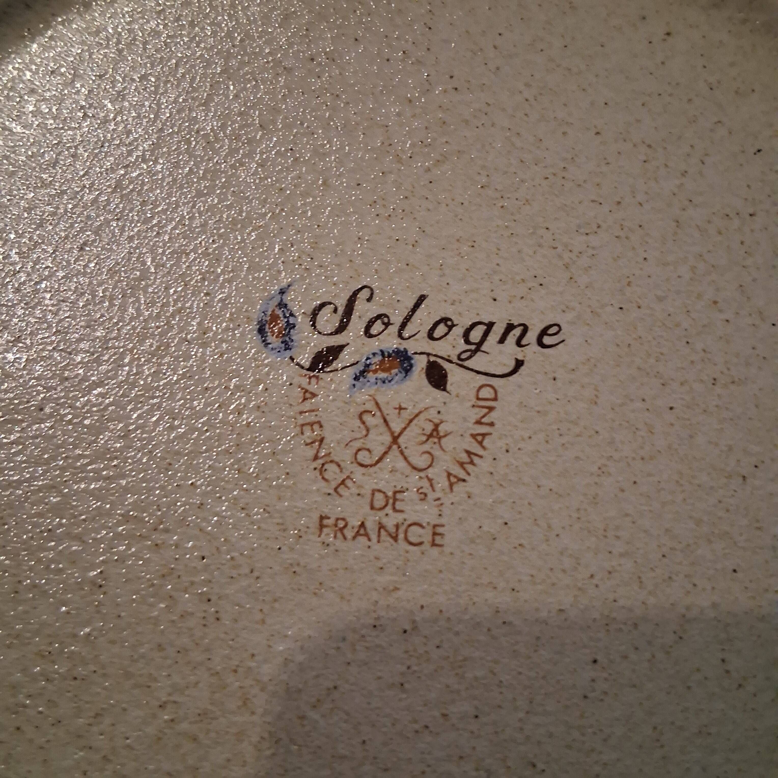 Set of 8 flat plates from St Amand model "Sologne" in good condition.