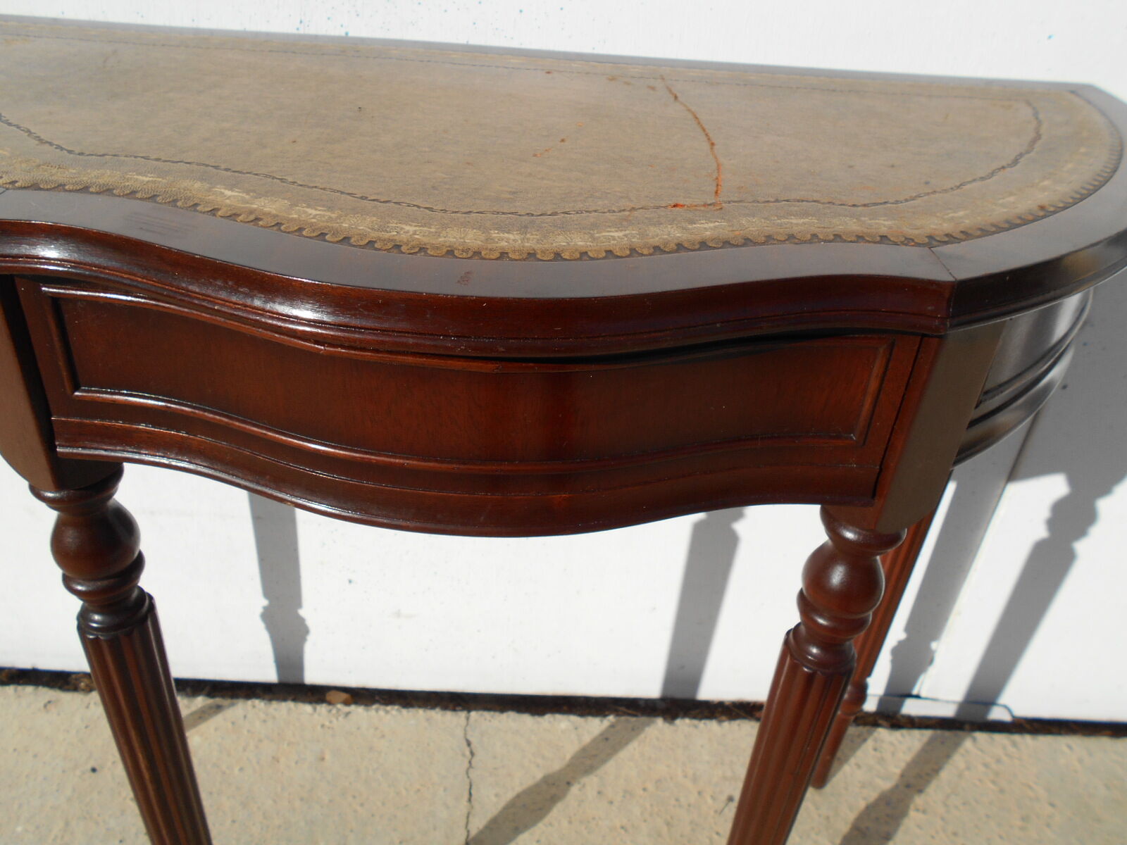English-style half-moon console, mahogany and leather
