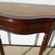 English-style half-moon console, mahogany and leather