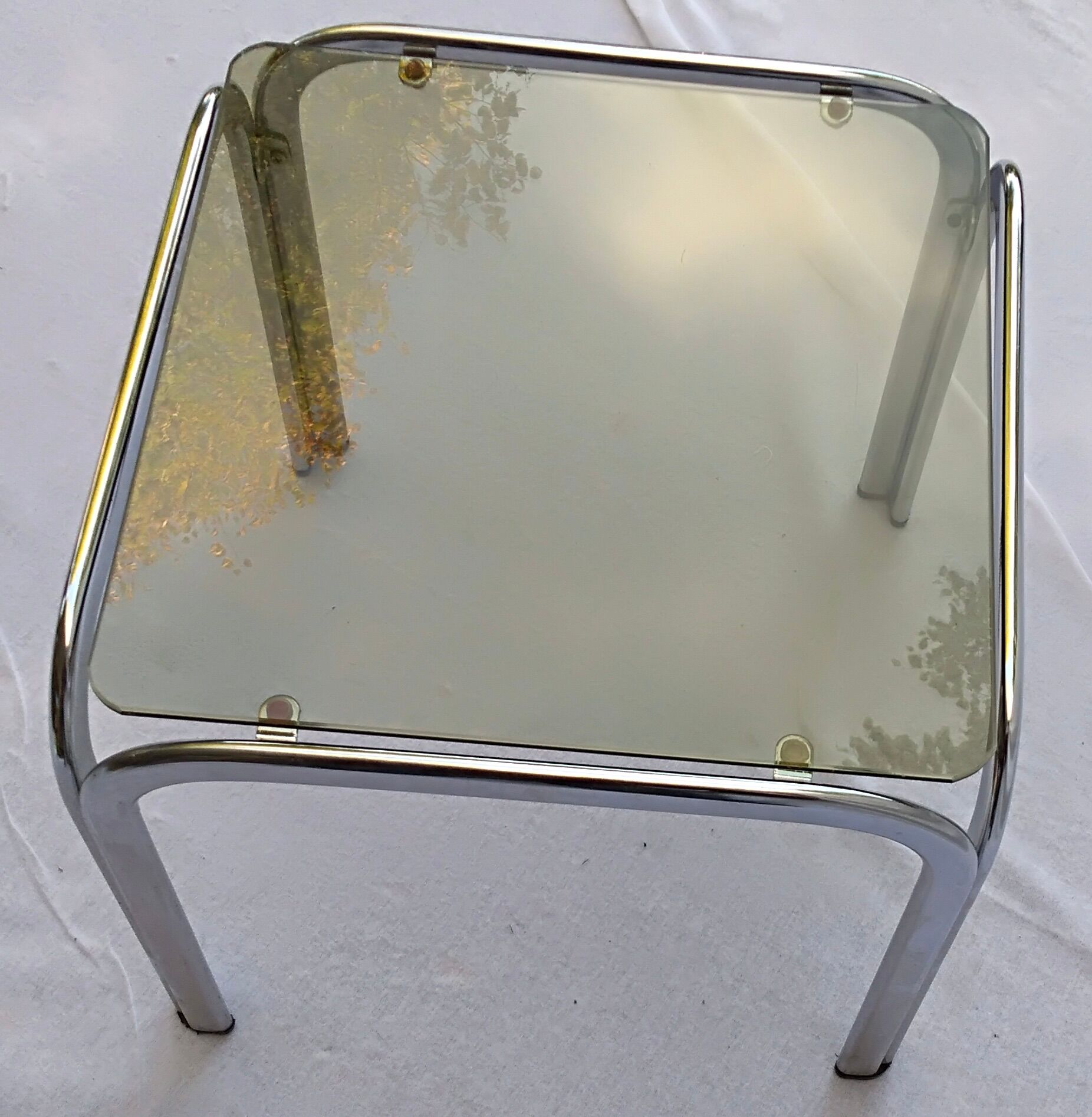 Square coffee table chromed metal and smoked glass