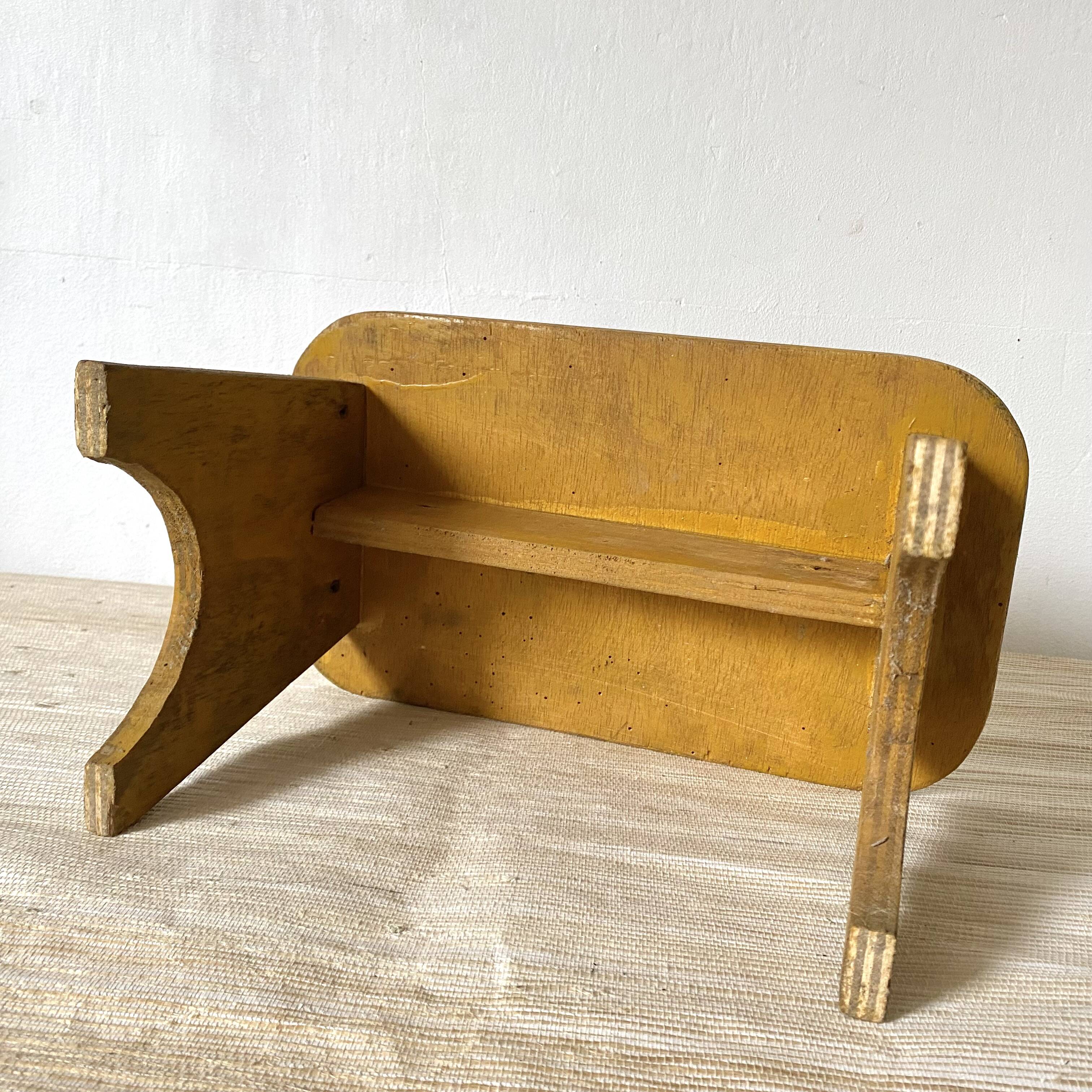 Low stool, plant stand in yellow painted wood