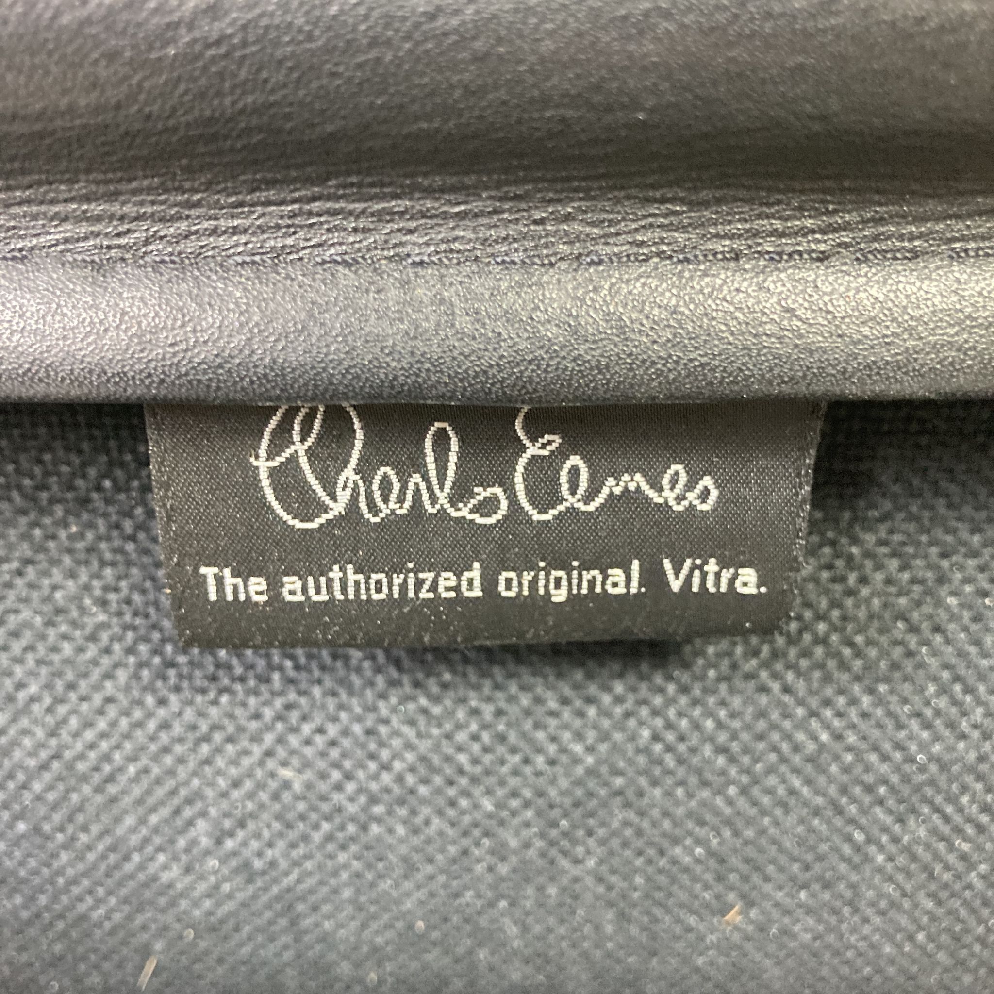 Eames black leather Soft Pad Group chair made by Vitra for Herman Miller