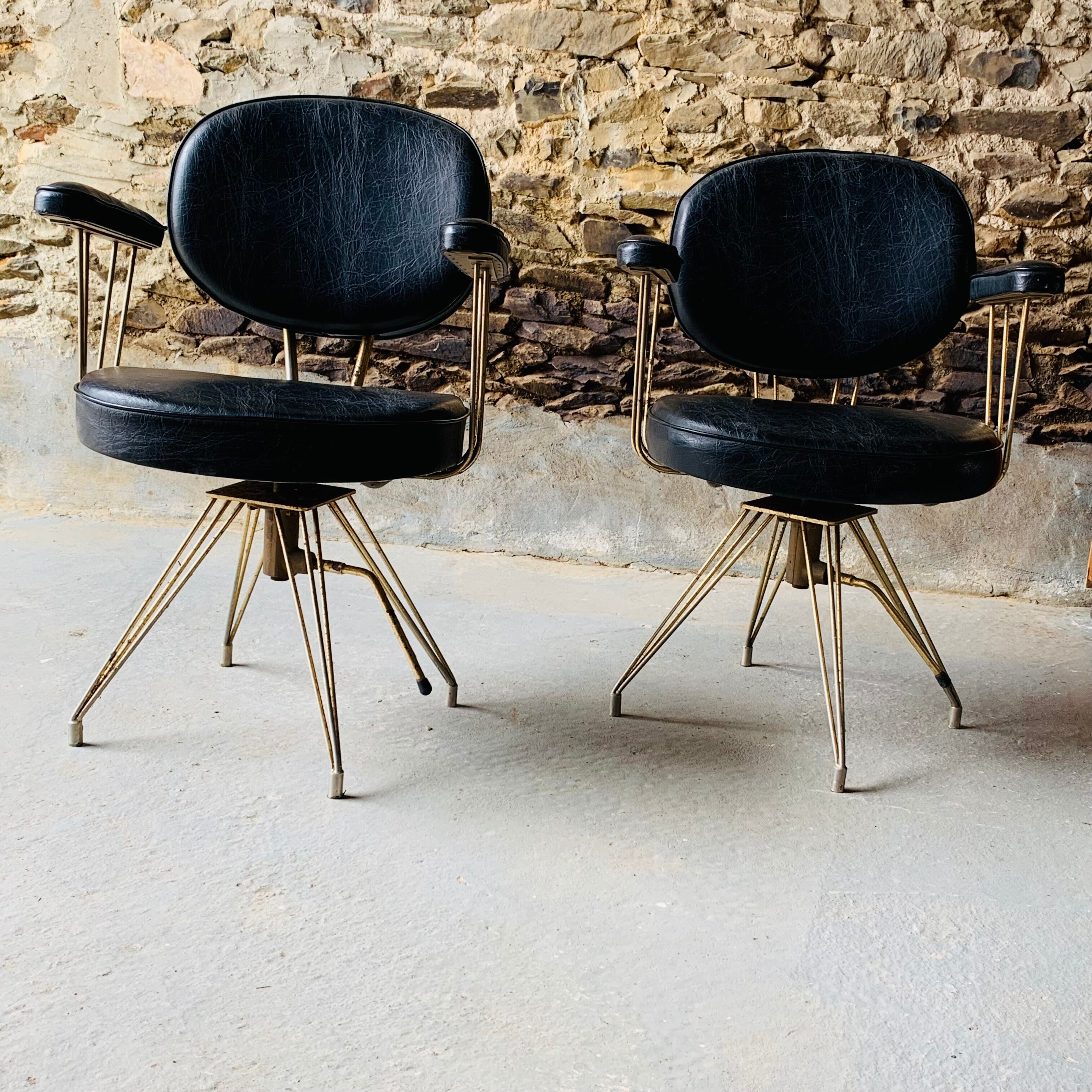 Set of 2 old hairdresser's chairs