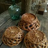 Set of three old rattan baskets