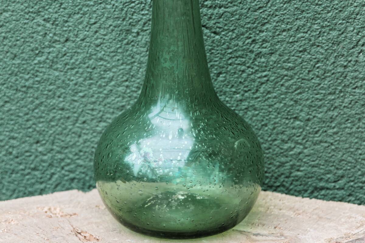 Single-flower vase in blown, bubbled glass, signed Biot
