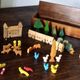 Village small farm wood painted with animals and characters stored in a large old box.